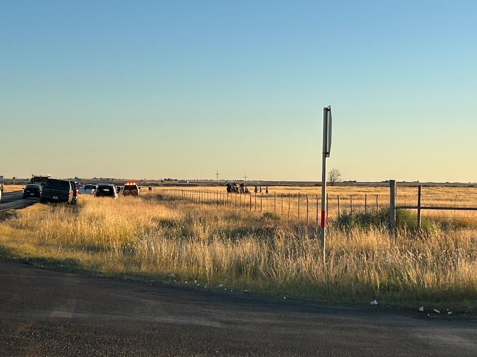 Vehicle rolls over in field north of Slaton Canyon