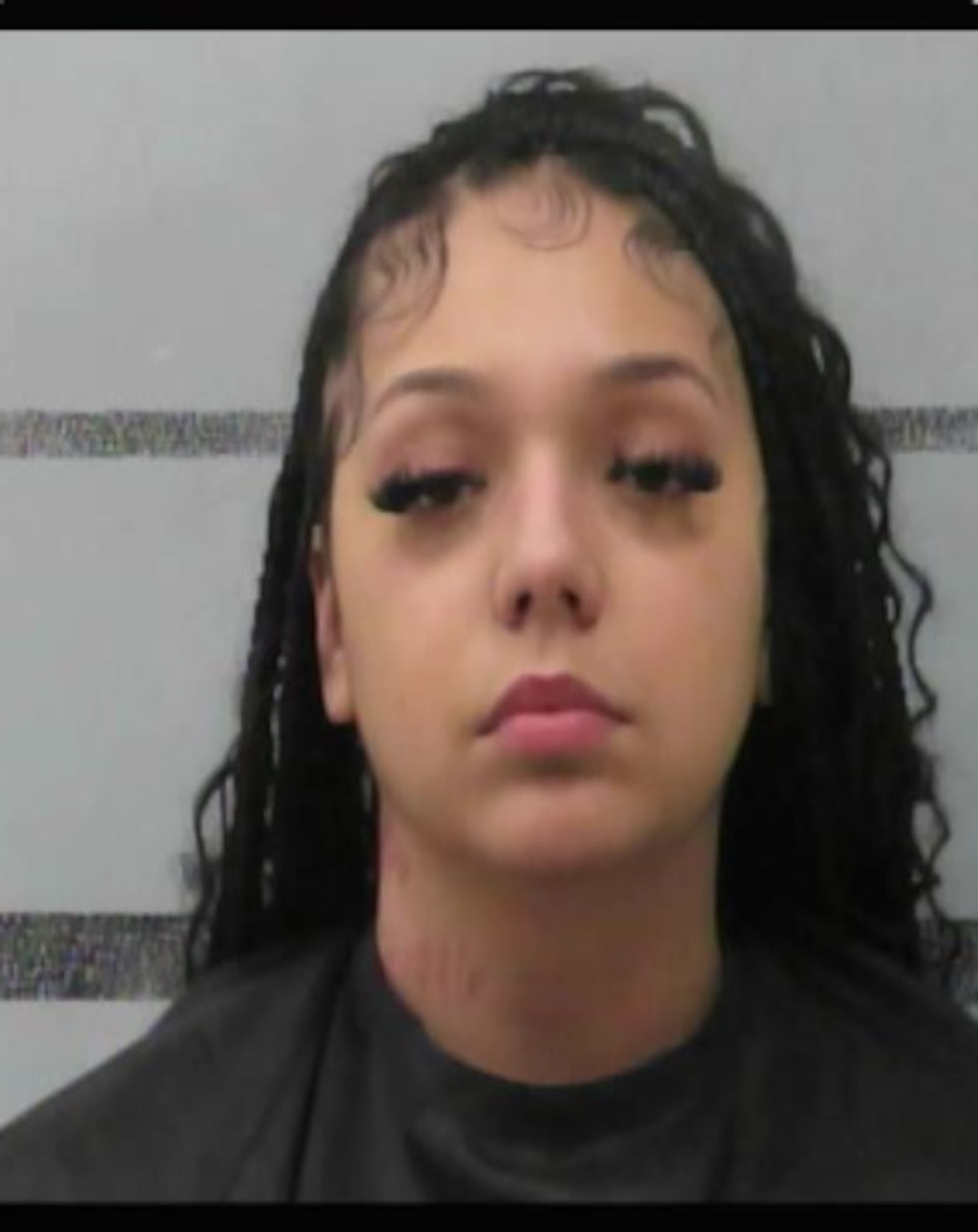 A woman is in jail accused of evading police after a crash in central Lubbock early Tuesday...