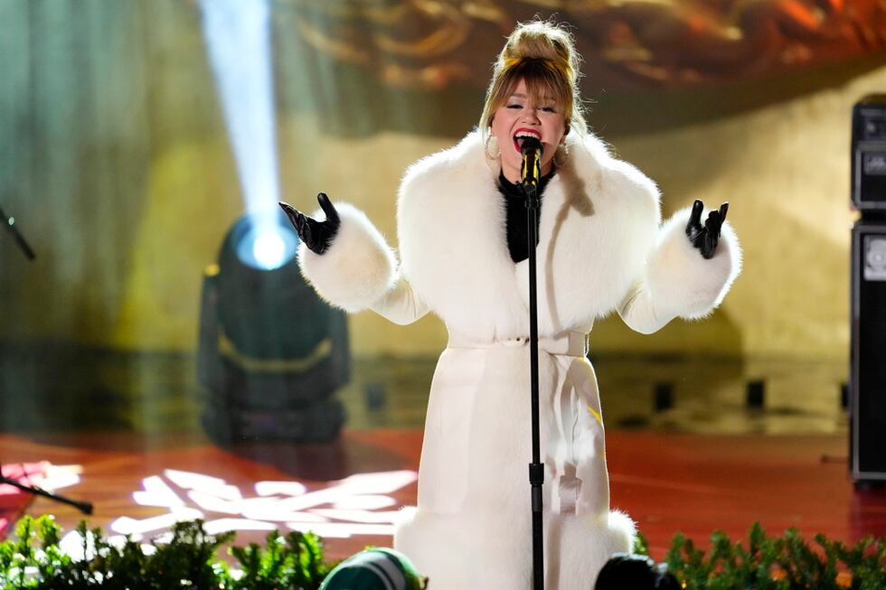 Kelly Clarkson performs at the Rockefeller Center Christmas tree lighting ceremony on...