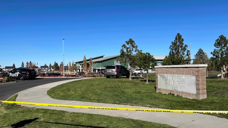 Police tape is placed outside Silver Rail Elementary school, where a shooting took place, on...