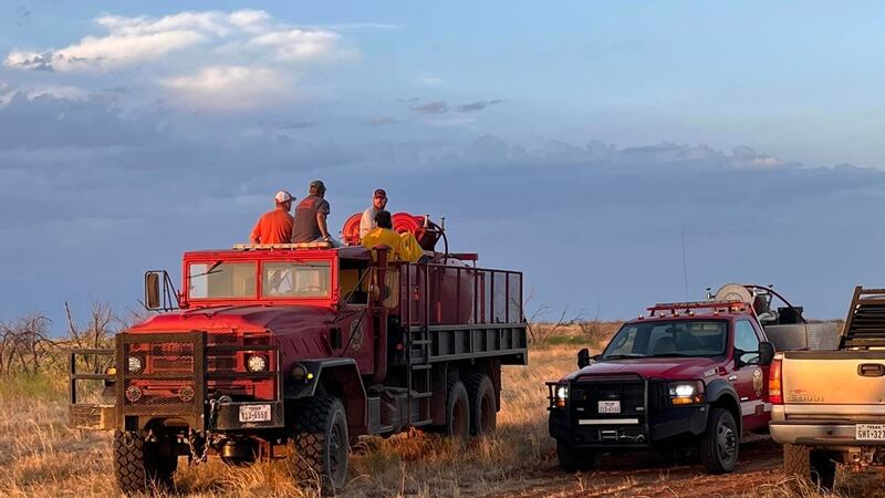 Firefighters continue battling a wildfire burning close to Paducah in Cottle County.