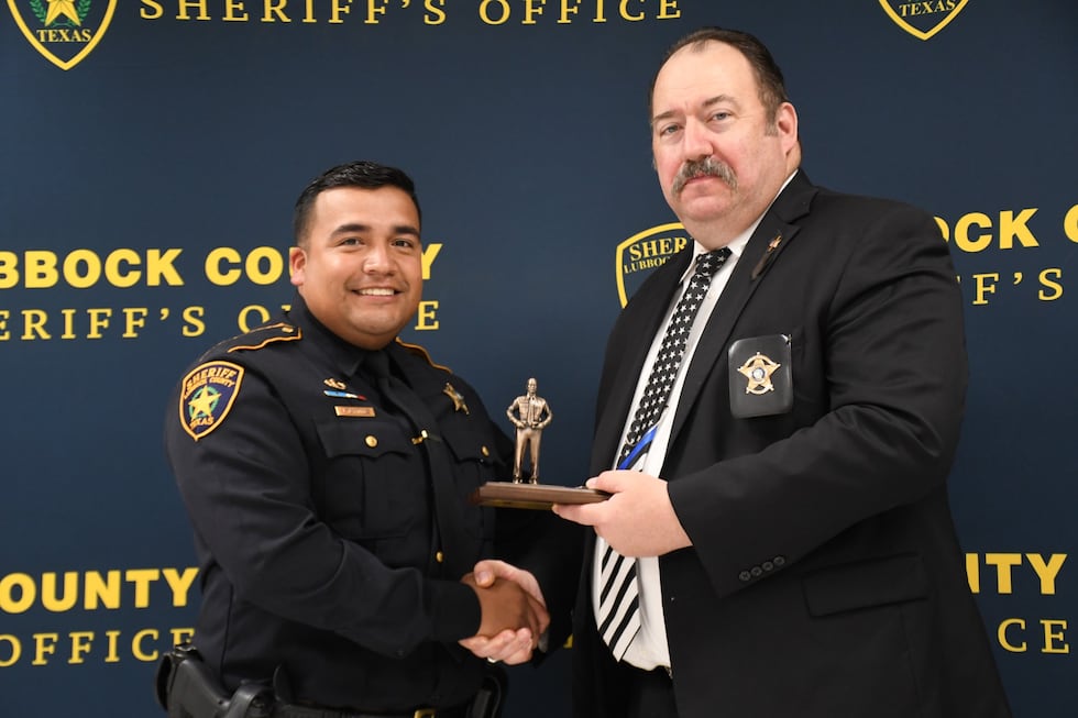 Deputy Martinez pictured at the LSO award ceremony with Sheriff Rowe where he was named...
