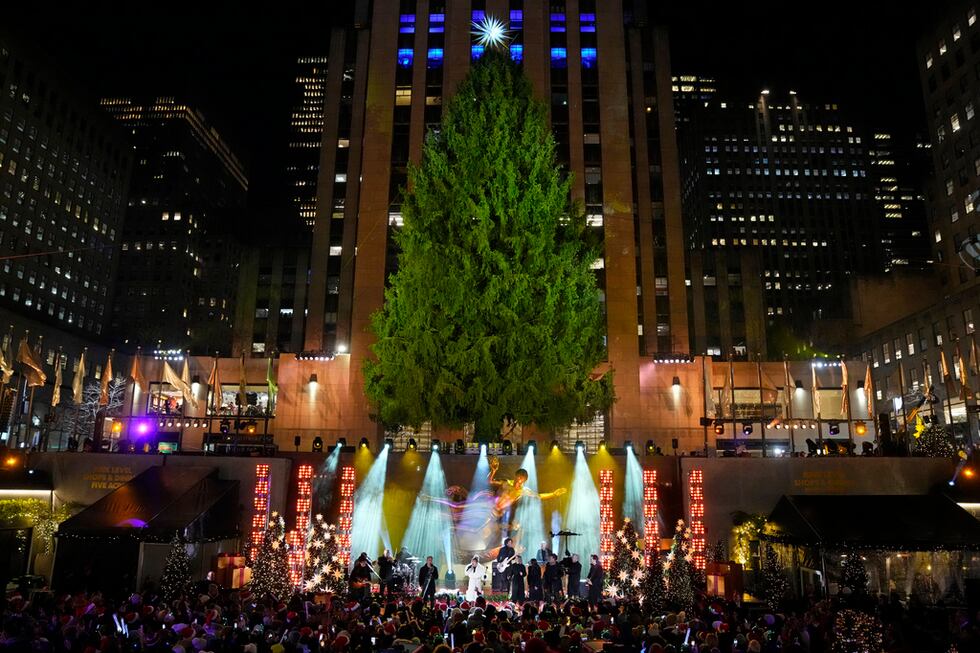 Kelly Clarkson performs at the Rockefeller Center Christmas tree lighting ceremony on...
