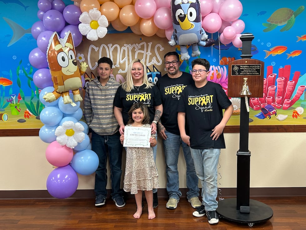 1st grader rings bell after battle with cancer