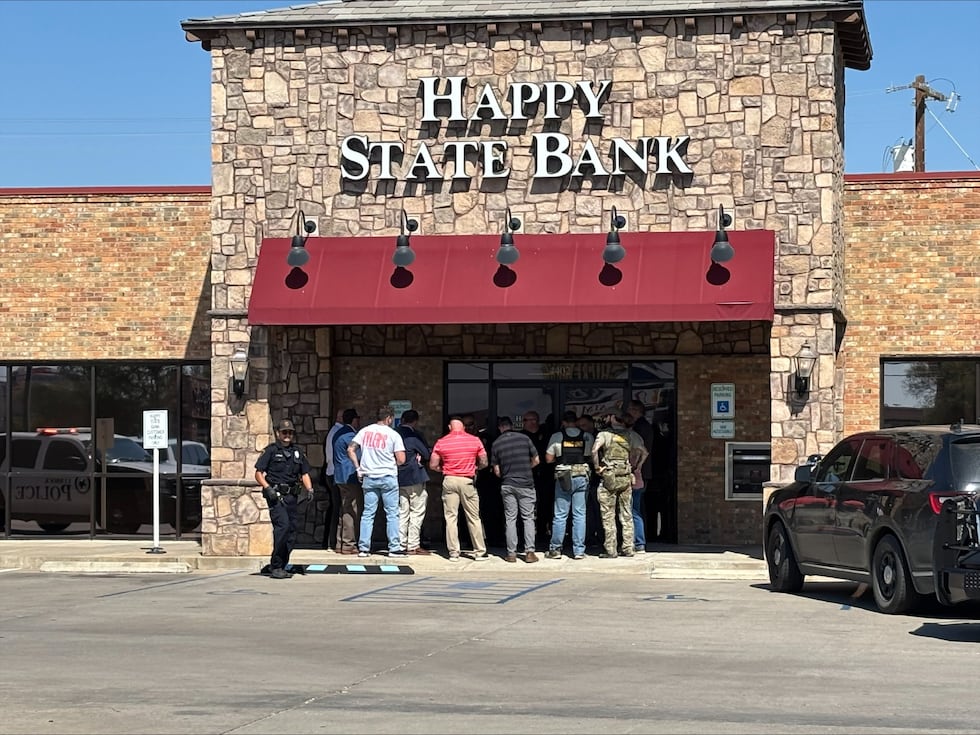 Police are on scene investigating reports of a bank robbery in west Lubbock.