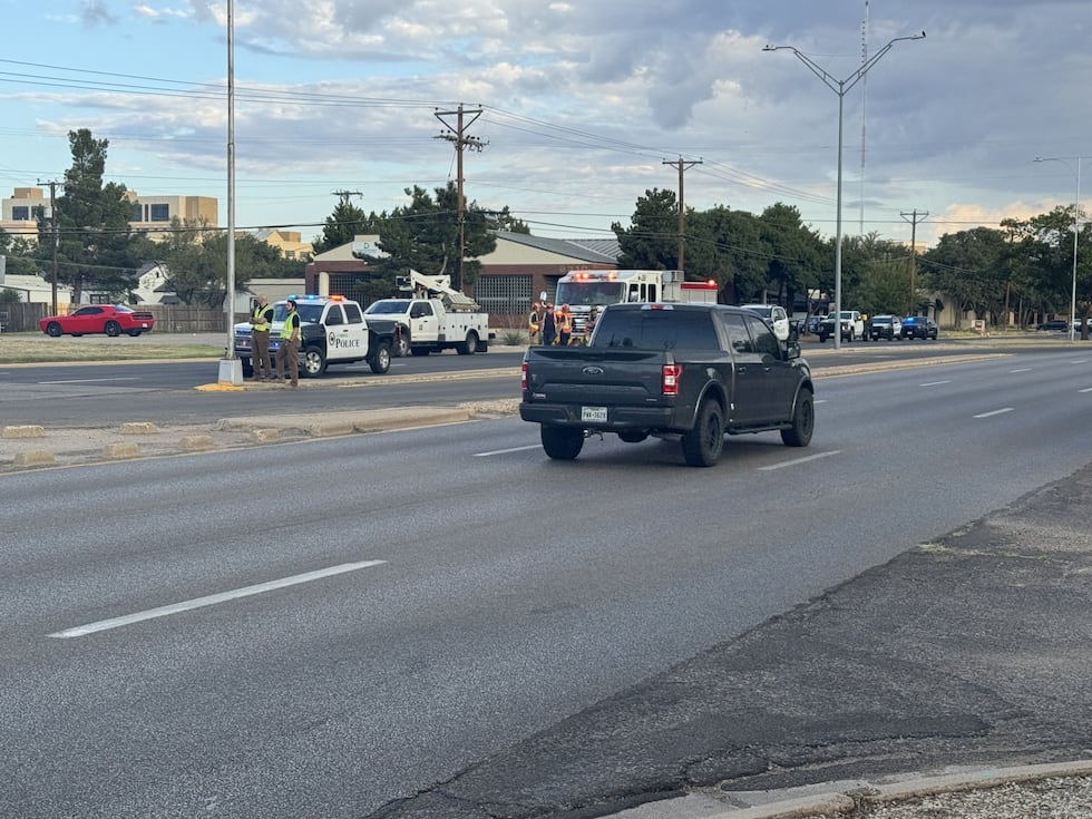 Police say a car crashed into a utility pole killing one person and injuring two others in...