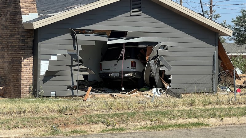 A vehicle drove into a house at 1700 block of East Colgate/300 block of North Aspen around...