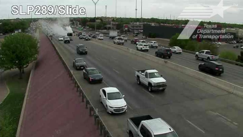 Emergency crews are responding to a rollover on South Loop 289 and Slide Road.